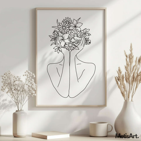 Black and white floral woman art print displayed in an art gallery setting, creating a statement piece.