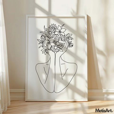 Large floral head woman line art print hanging on a white wall in a contemporary living space.