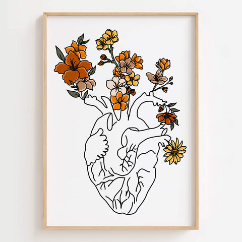 A colorful floral heart wall art print with intricate floral patterns and heart anatomy.