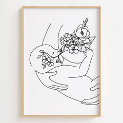 Monochrome Floral Mother Baby Art Print displayed in a serene nursery with soft decor.