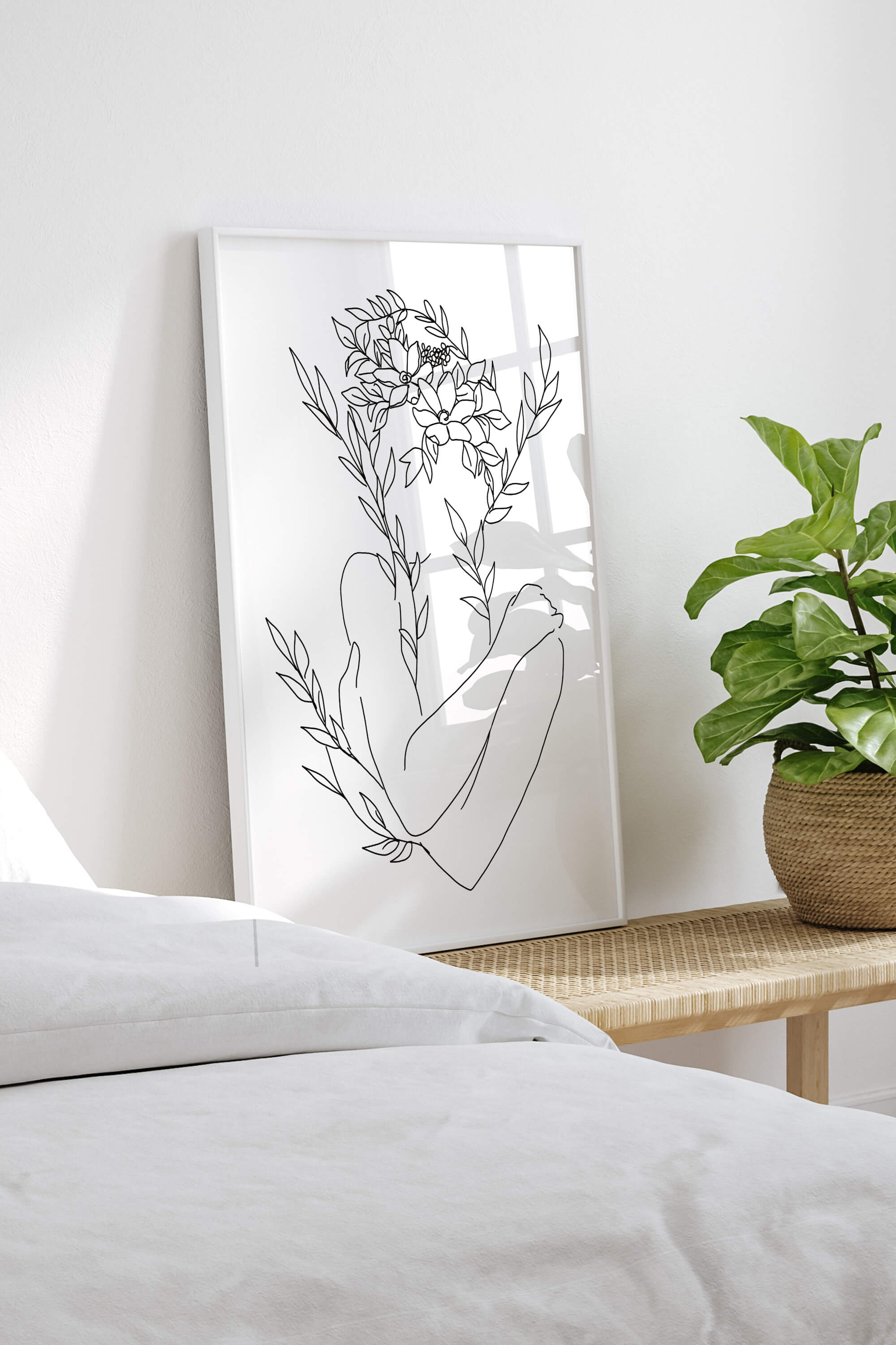 An abstract celebration of beauty through line art and floral silhouette. This piece reflects diversity and individuality with a captivating combination of abstract elements and the female form.