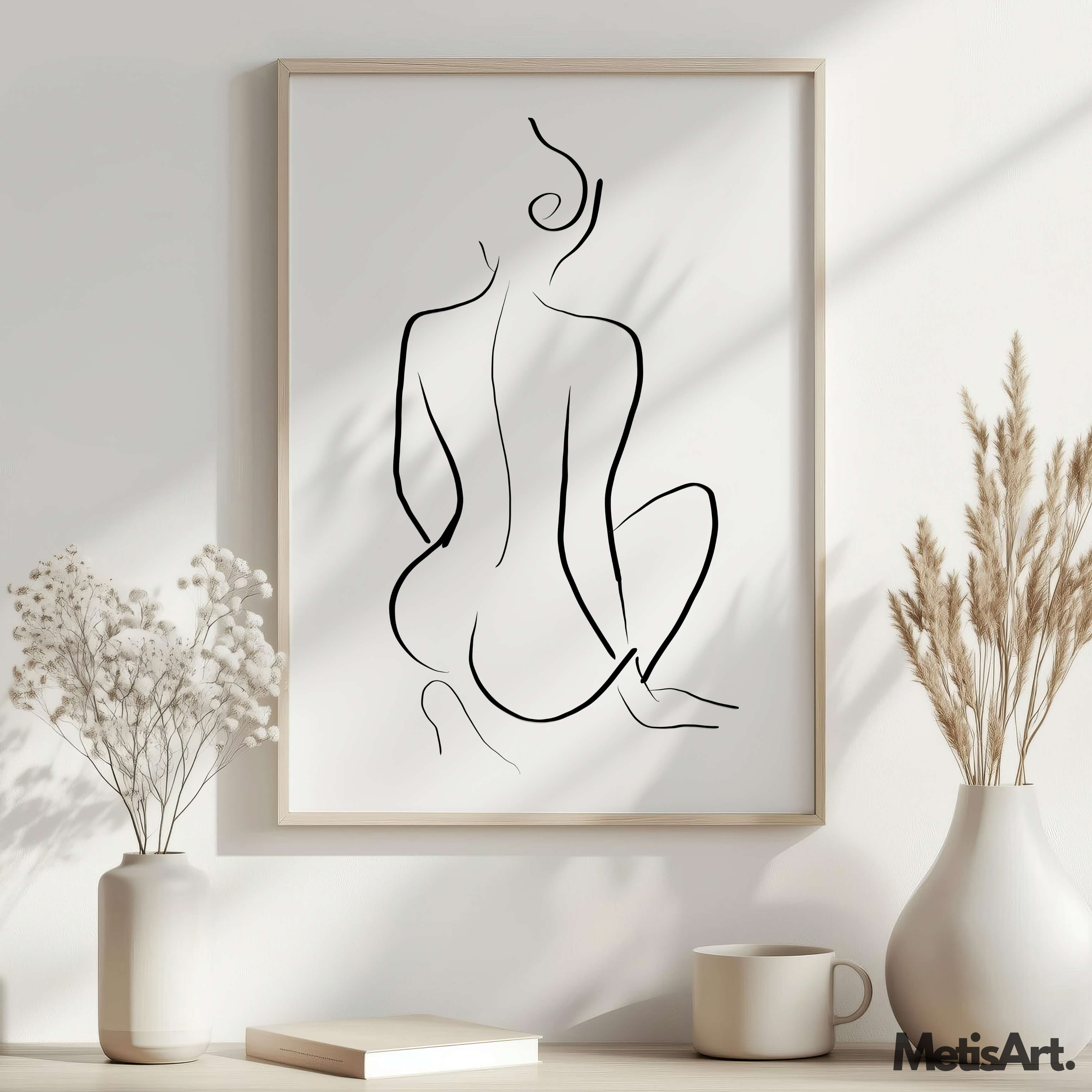 Elegant female back line art in feminine bedroom decor, offering a timeless and sensual touch to the room.