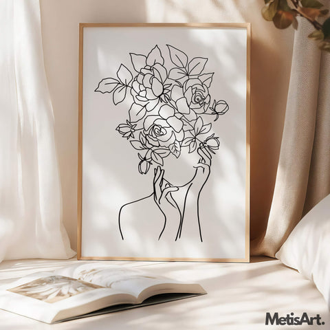 Black-and-white feminine floral woman face art in a bedroom, offering an elegant touch to the decor.