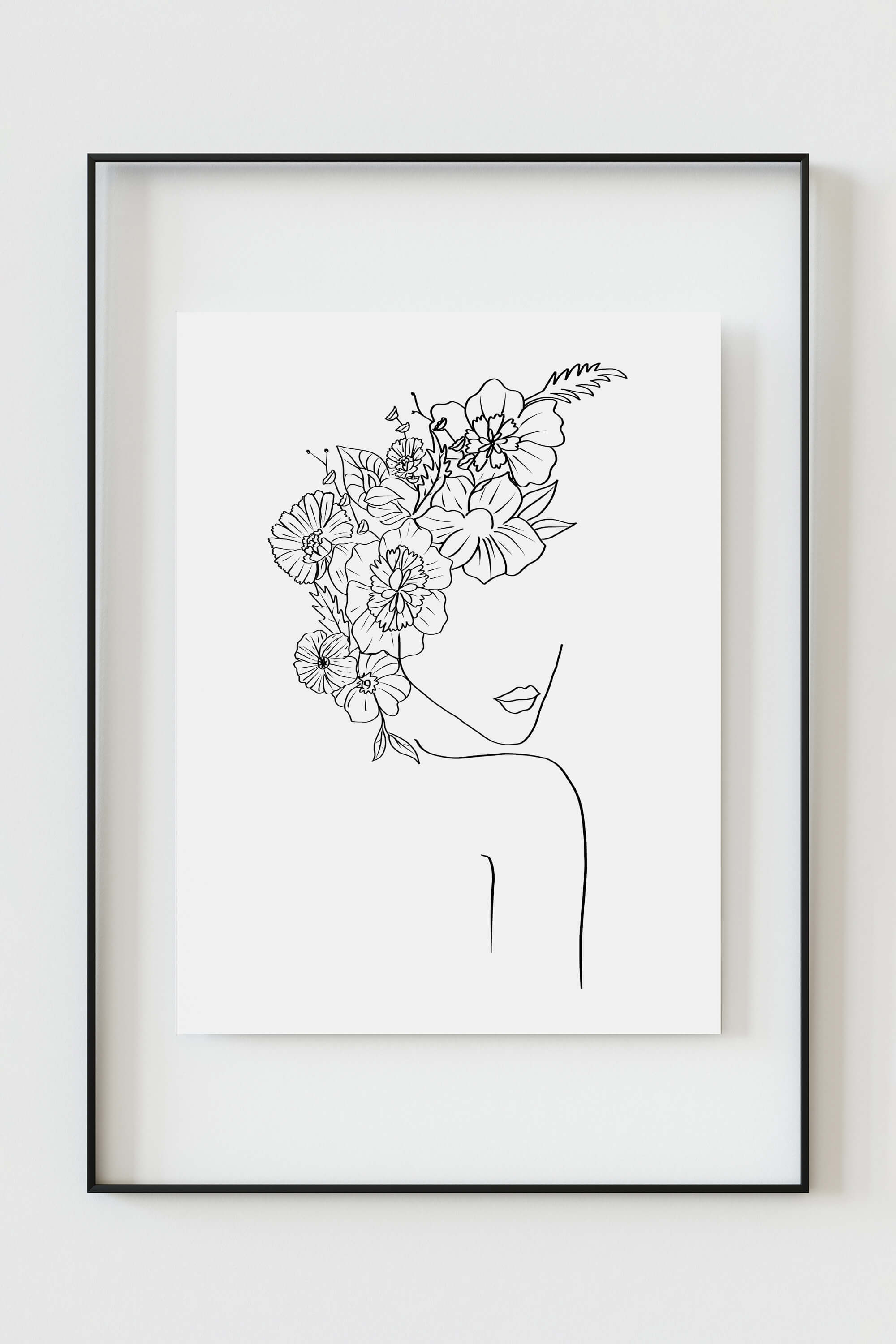 Bohemian chic line art female poster, blending boho style with botanical motifs. Graceful and sophisticated, this art print adds a touch of nature-inspired charm to your space.