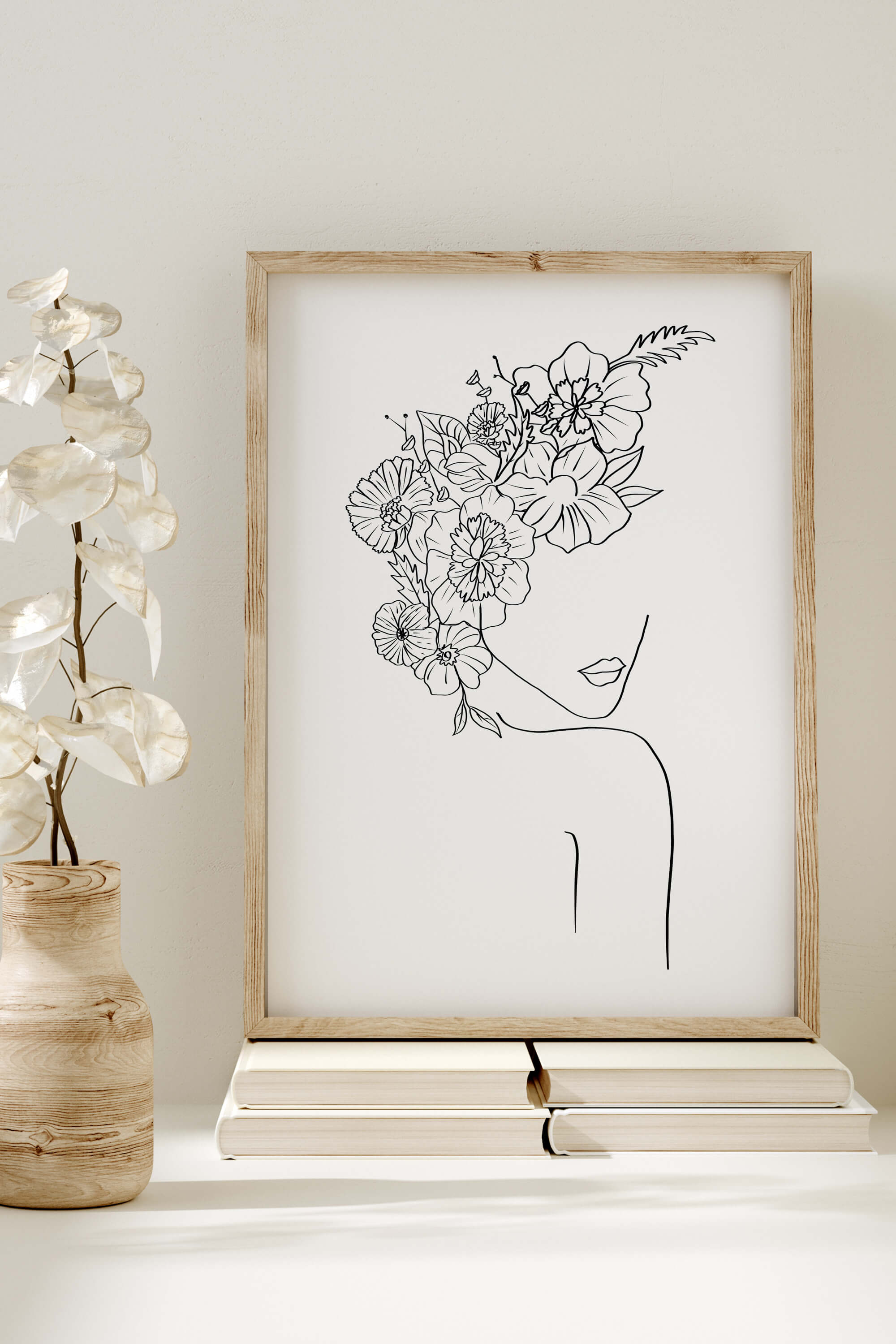 Captivating botanical elegance in black and white line art. Detailed and refined, this art print showcases the delicate beauty of flowers, offering a timeless addition to your decor.
