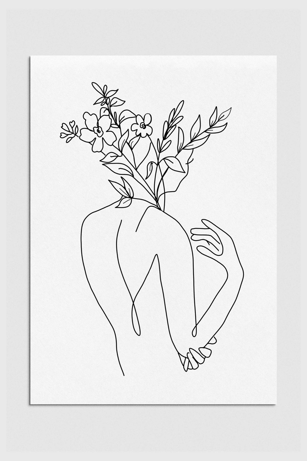 Botanical woman's back line art in black and white. Elegant and empowering, this limited edition print captures the harmonious balance of nature-inspired beauty. Perfect for bedroom wall decor.