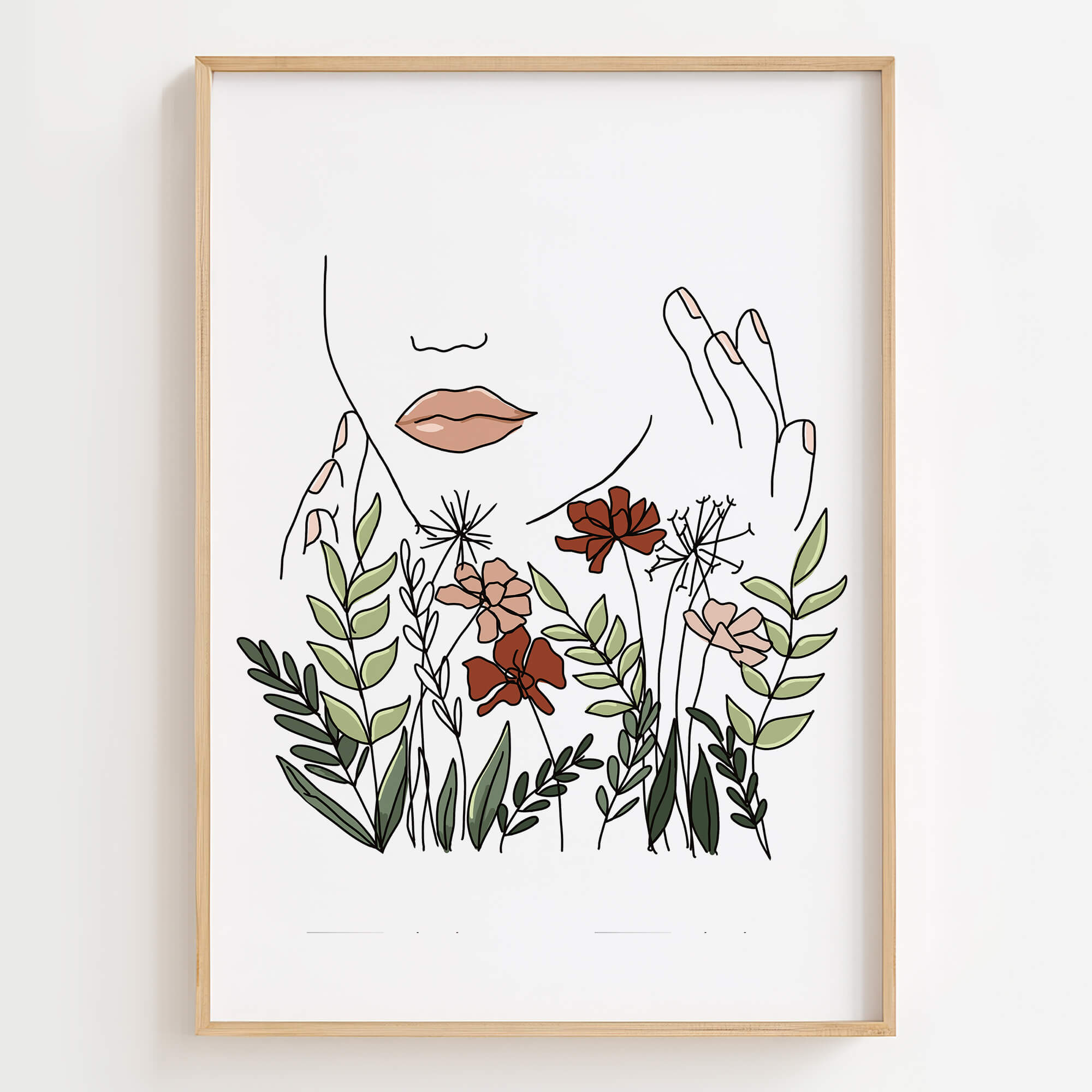 Colorful line art print of a woman's face surrounded by red, pink, and green flowers and leaves in a wooden frame.