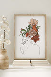 Contemporary line art of a woman's back featuring a floral design, perfect for modern home decor.