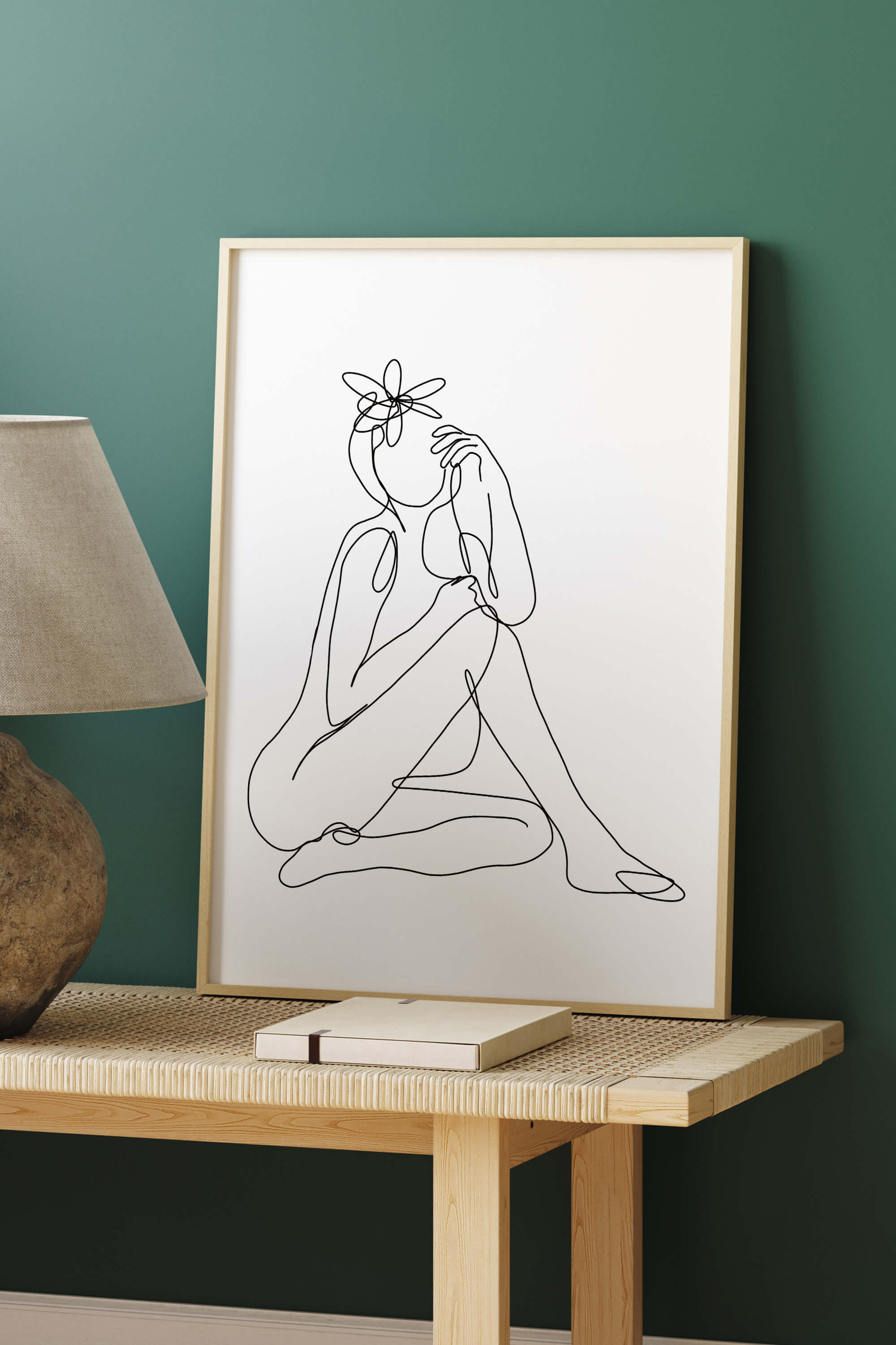 Contemporary charm in a one-line drawing, creating a unique and captivating wall decor piece. The simplicity of the lines adds a modern touch, making it an ideal choice for those seeking art that stands out.