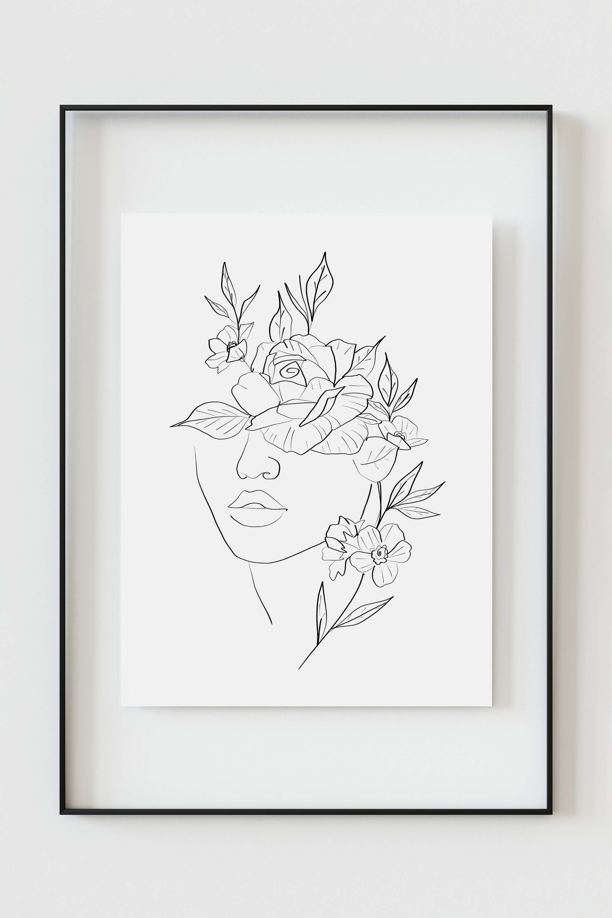 Immerse yourself in a visual symphony of black and white, showcasing the beauty of a woman's face intertwined with delicate roses, a perfect addition to your sophisticated wall decor.