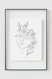 Immerse yourself in a visual symphony of black and white, showcasing the beauty of a woman's face intertwined with delicate roses, a perfect addition to your sophisticated wall decor.