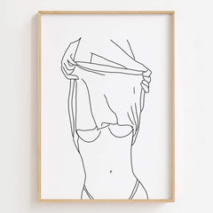 Empower Women Line Art Print displayed in a bedroom, adding empowerment and elegance to the space.