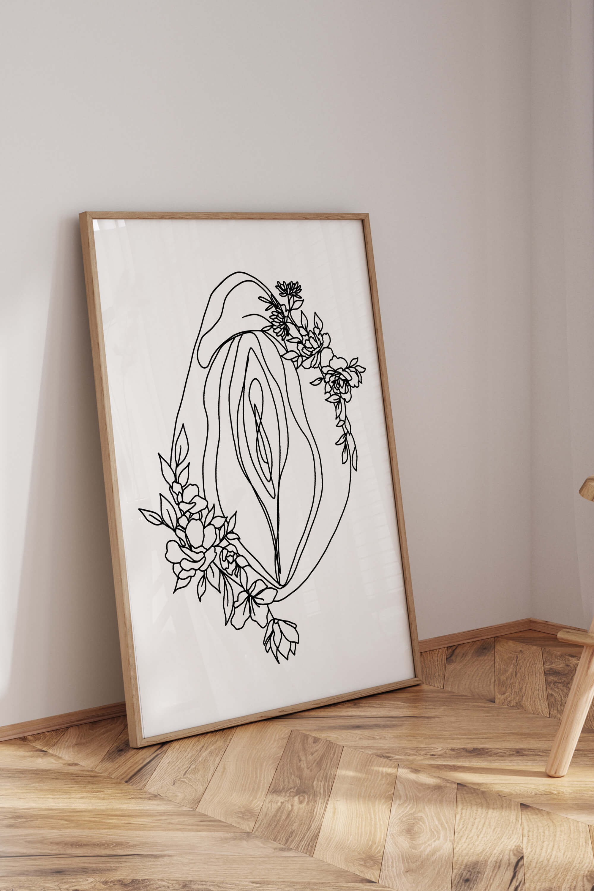 Close-up details of a monochrome floral vagina art print, showcasing the intricate lines and bold design. A modern and empowering piece with attention to detail. Ideal for adding a touch of strength to any space.