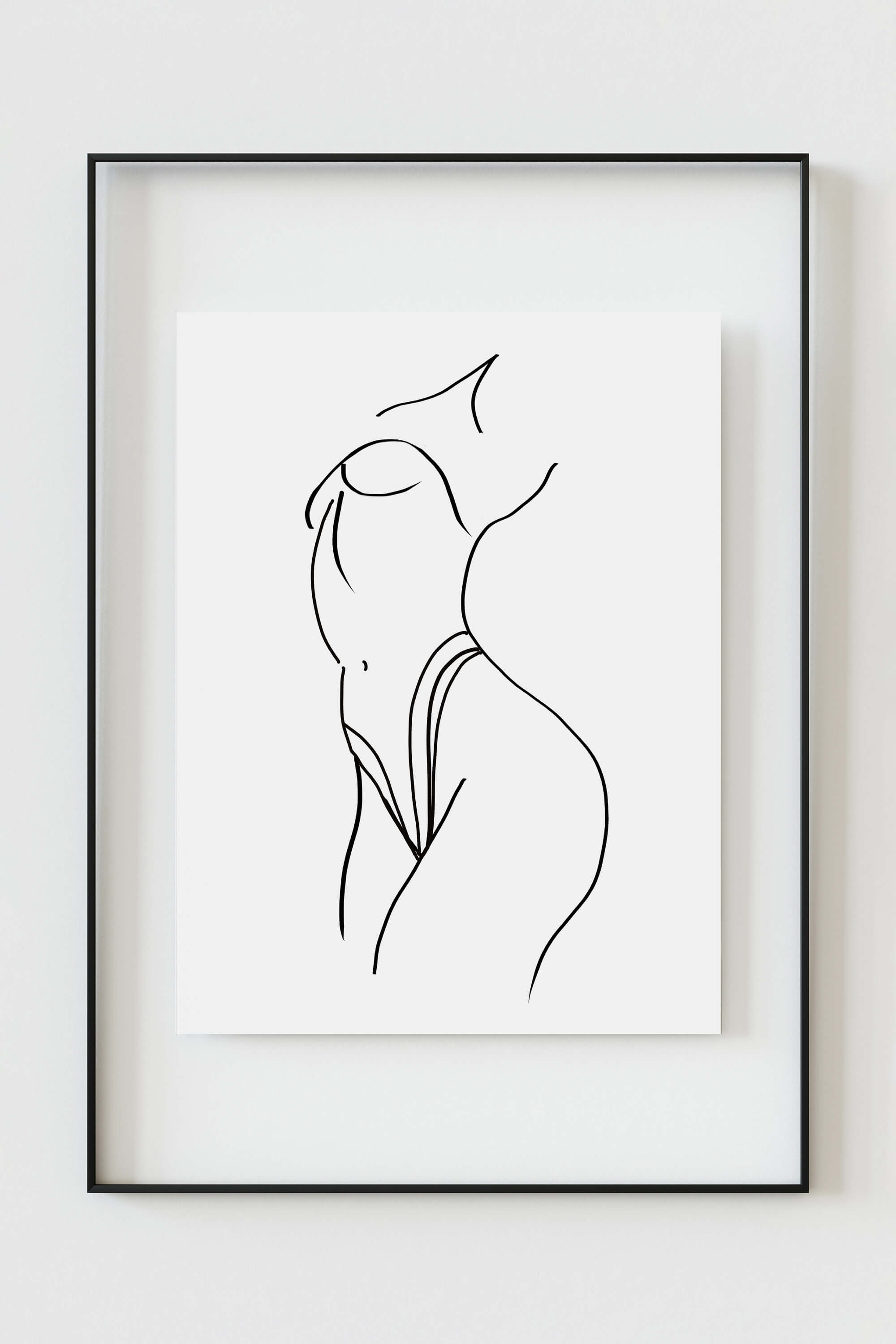 Monochrome wall art featuring an elegant female figure drawing. The timeless beauty of the artwork seamlessly integrates into various living spaces. Elevate your decor with this sophisticated and versatile art print.