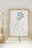 Celebrate feminine beauty with this modern line art print. Elegant lines capture the essence of strength and charm. 