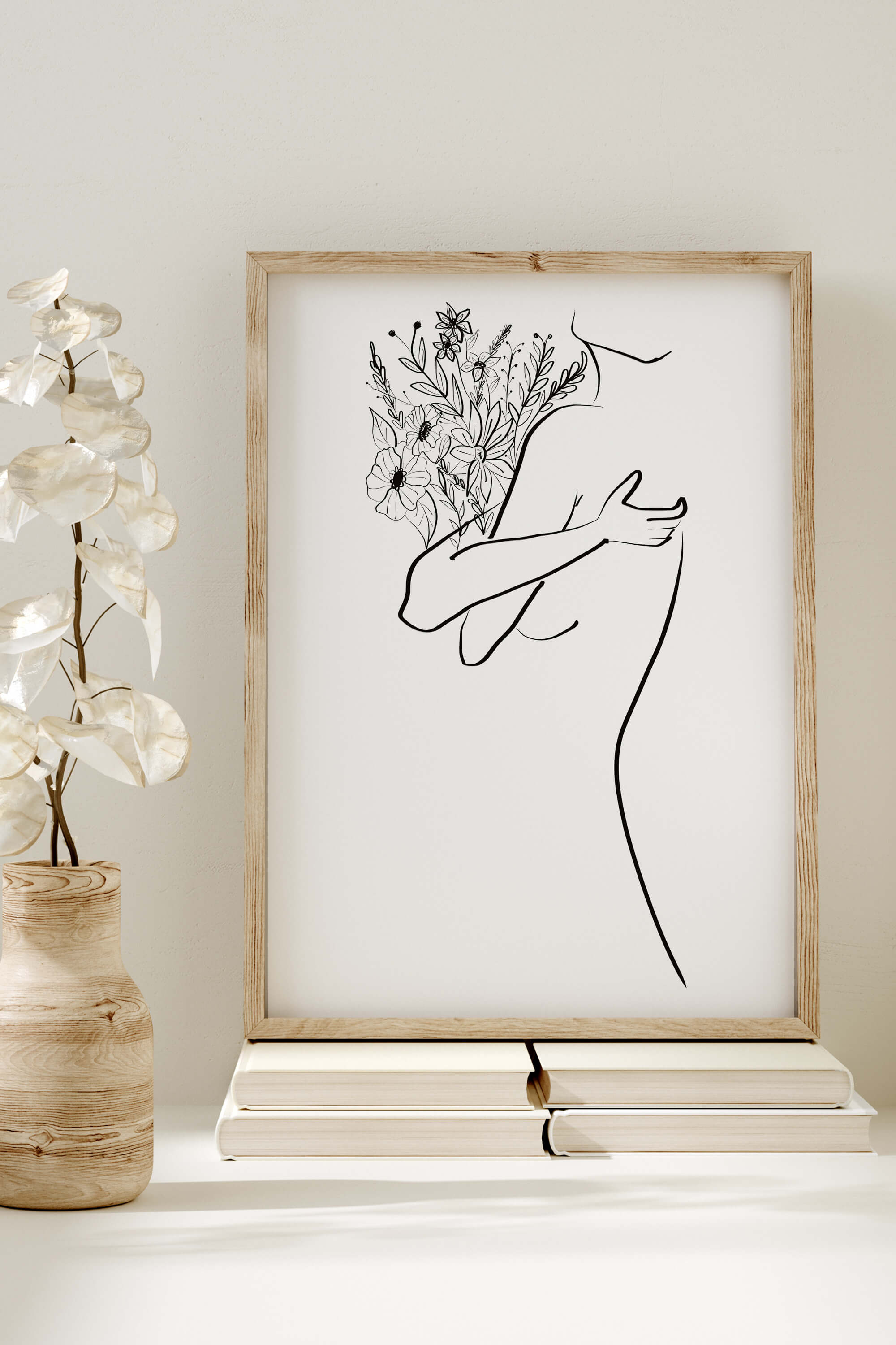 Feminist poster depicting a strong woman in black and white art. The empowering line drawing celebrates individuality and power. Perfect for those who appreciate bold expressions and want to make a statement with their art.