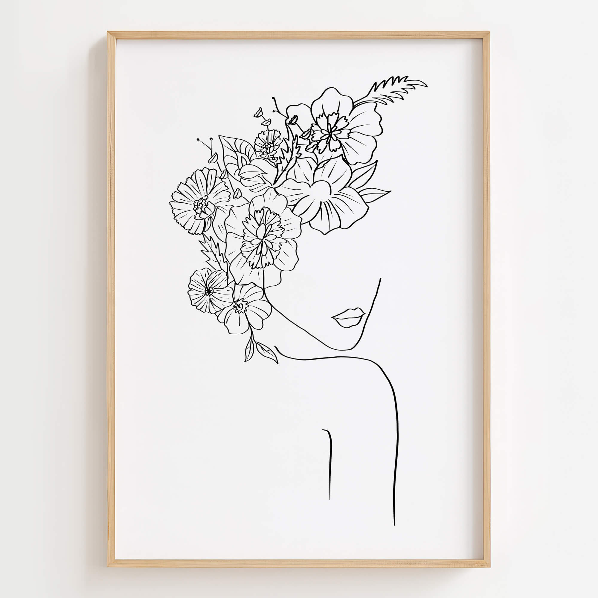 Floral Head Female Line Art Print displayed in a modern living room, adding elegance and feminine charm to the space.
