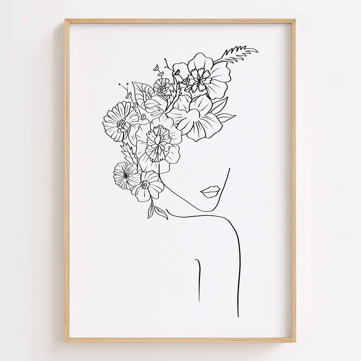 Floral Head Female Line Art Print displayed in a modern living room, adding elegance and feminine charm to the space.