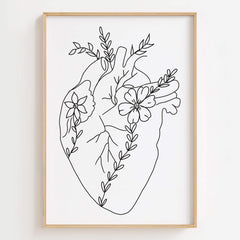 Floral Heart Line Art Print displayed in a modern bedroom, adding love-inspired elegance to the decor.