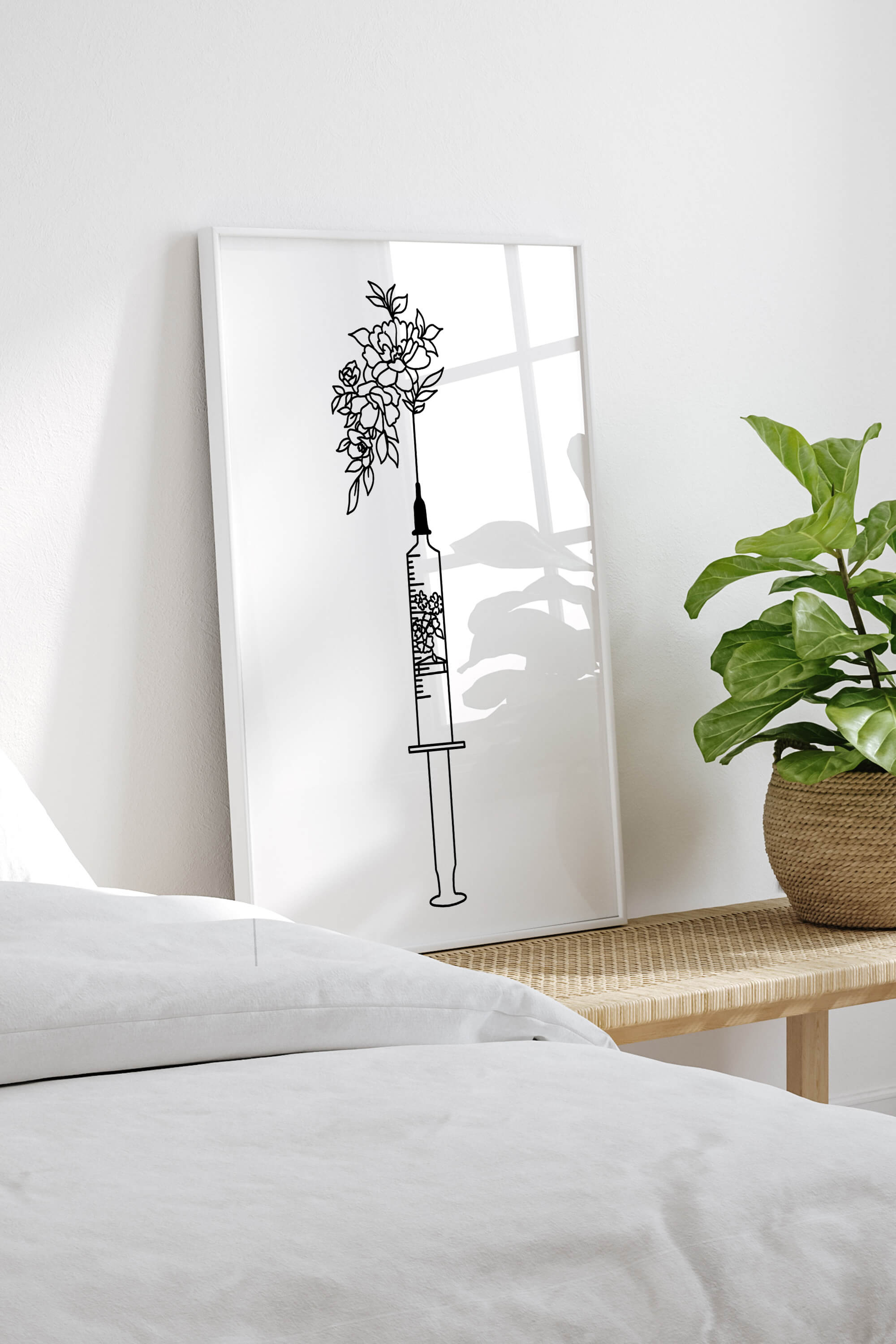 Elevate your space with monochrome sophistication in this floral syringe wall art. Precision meets elegance in black and white, making it a timeless addition to any decor. Perfect for those with discerning tastes.