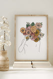 Graceful line artwork of a woman with a floral headpiece, blending simplicity with floral sophistication.