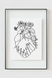 A black and white art print that shows the human heart anatomy with aesthetic flower lines. The print combines organic and geometric shapes and represents the beauty and fragility of life and love.