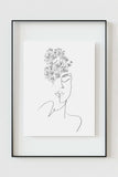 Close-up of our captivating woman portrait black and white line art print, showcasing the delicate balance of intricate floral details and graceful lines - a timeless piece for elegant and contemporary spaces.