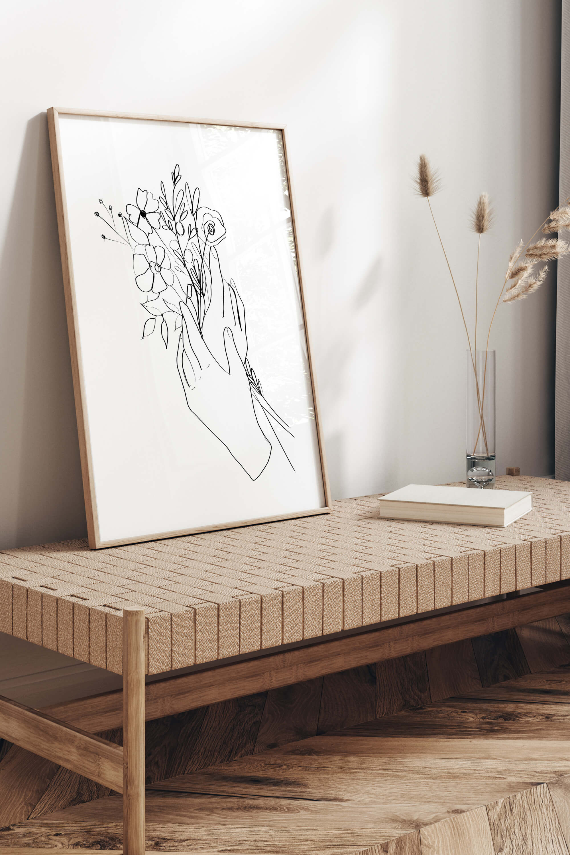 An eye-catching print with detailed line art, perfect for monochrome enthusiasts. Bring sophistication to your walls with this captivating depiction of a woman holding a bouquet.