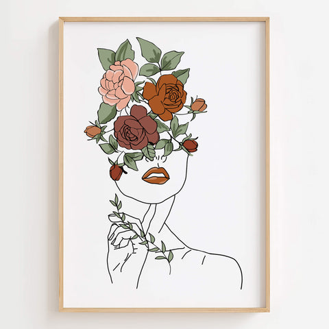 Minimalist line art print of a woman's face with flowers and a branch.