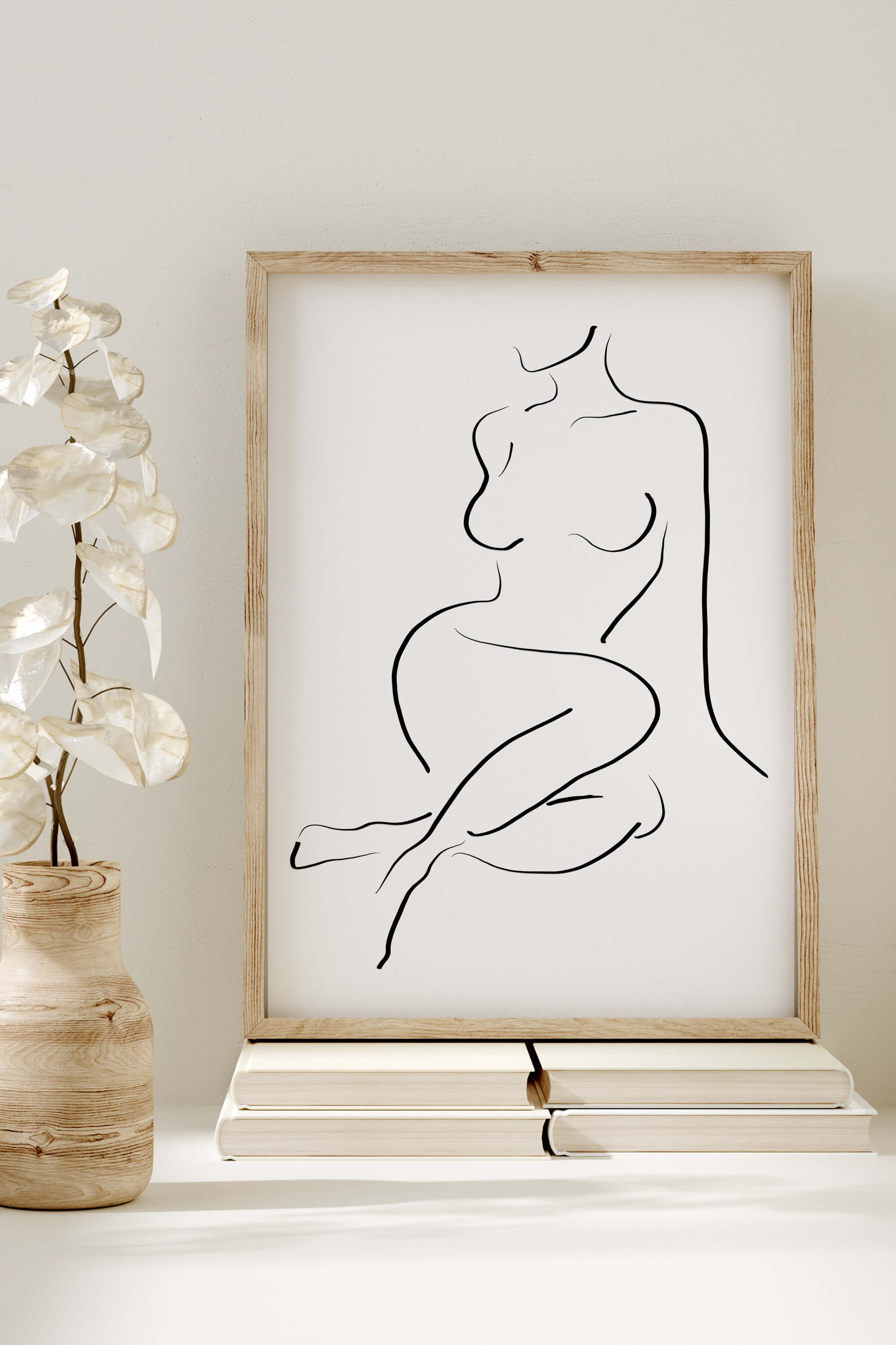 Abstract female wall art print, a blend of modern elegance and raw sensuality. Minimalist beauty in black and white, perfect for contemporary living spaces. Elevate your decor with this sophisticated and captivating art piece.