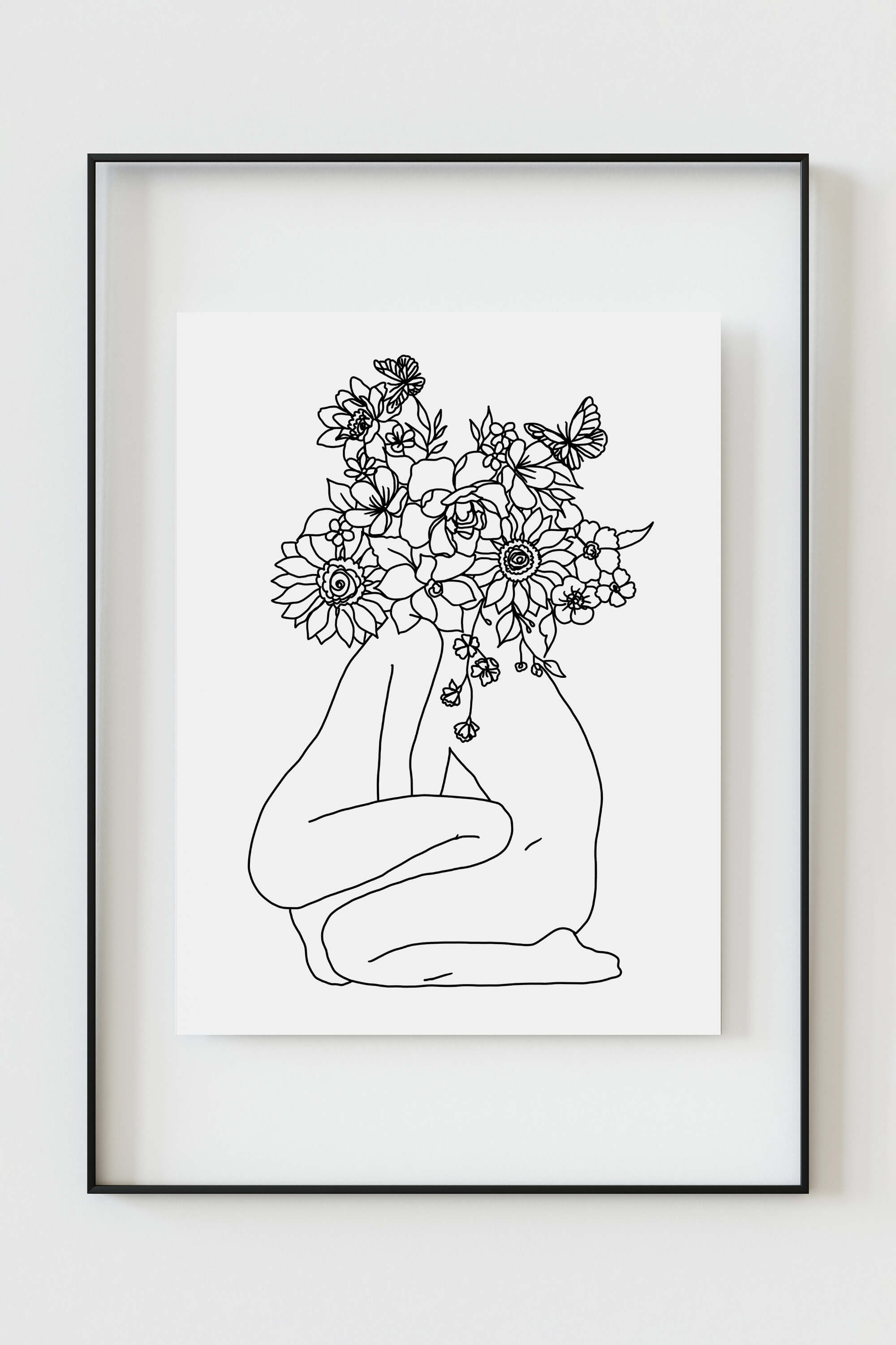 Sensual and sophisticated, this art print showcases the curves of a woman's body in exquisite line art.