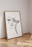 Monochrome Line Art Magic - A mesmerizing black and white art print featuring delicate lines, shadows, and a woman's face, bringing timeless charm to your space. Monochrome wall art at its finest.
