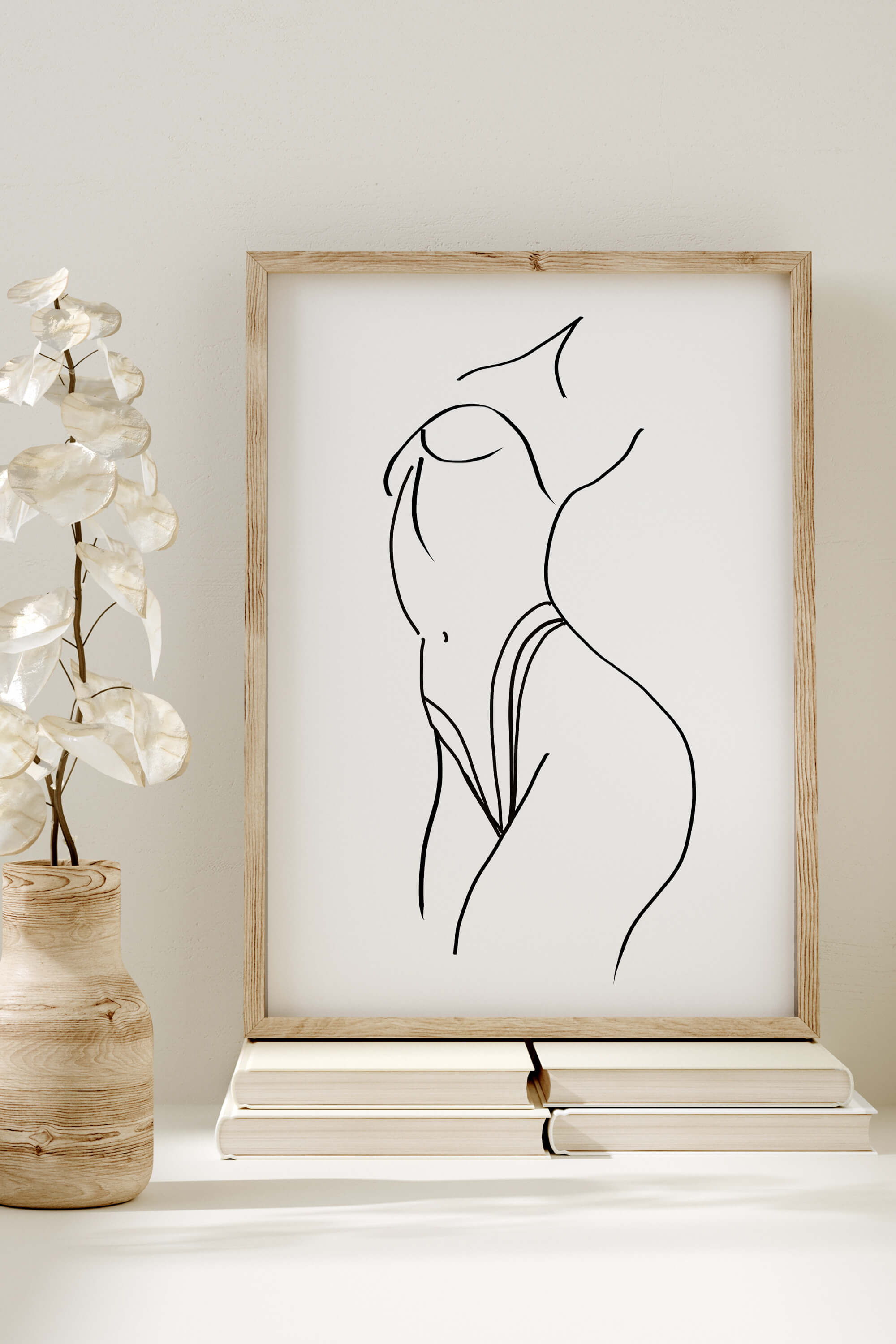 Captivating black and white art print showcasing a sensually drawn female form. The carefully selected lines evoke passion and desire, creating an intimate atmosphere. Ideal for those seeking art that ignites the senses.