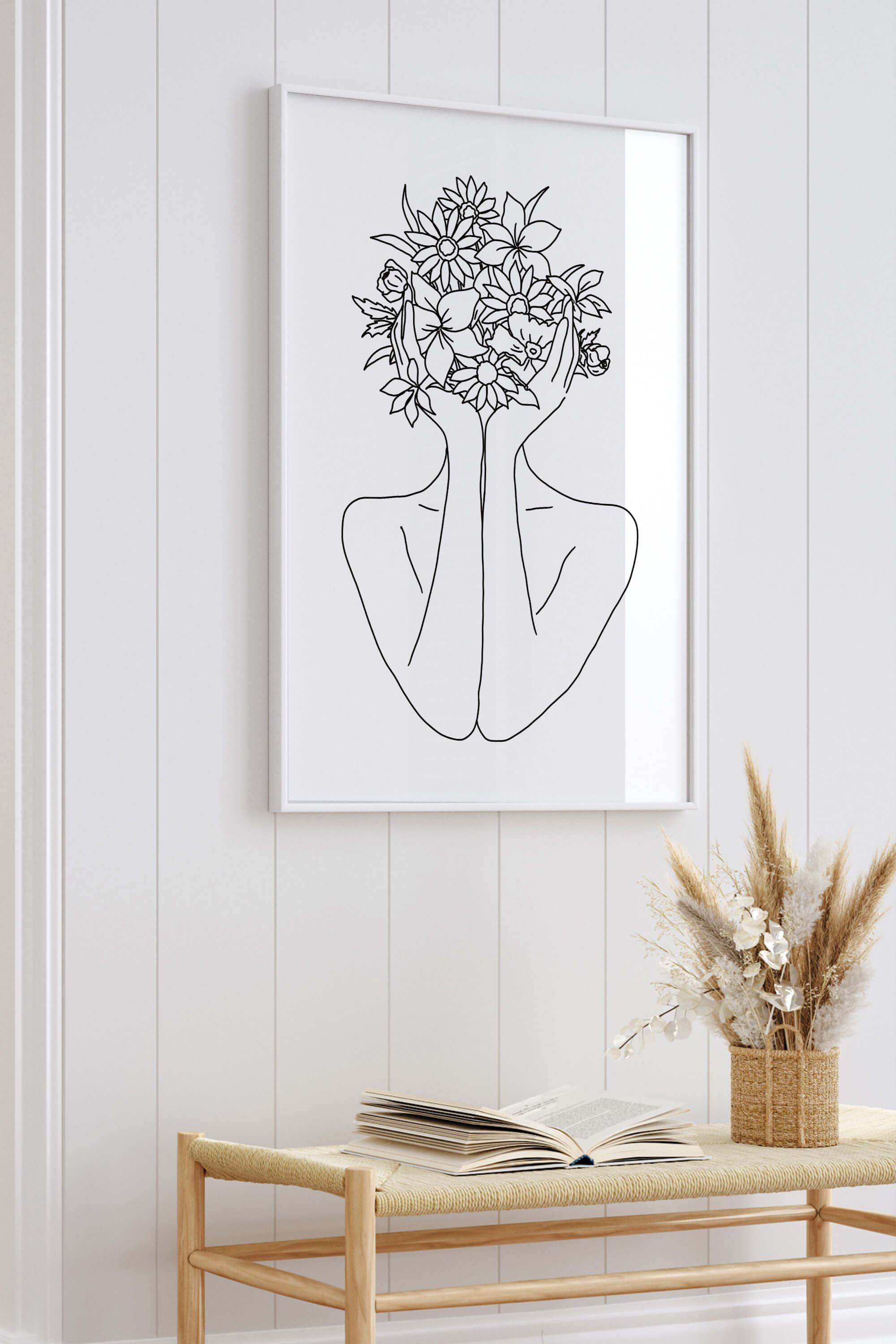 Fine art black and white line art print capturing the essence of abstract beauty. The image, with its floral motifs and woman's face, adds a timeless touch to your surroundings. Create a unique ambiance with this striking monochrome wall art.
