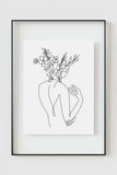 Positive energy wall decor featuring an inspirational woman figure in monochrome tones. The captivating lines evoke empowerment and grace. Ideal for those seeking a feminist touch in their home.
