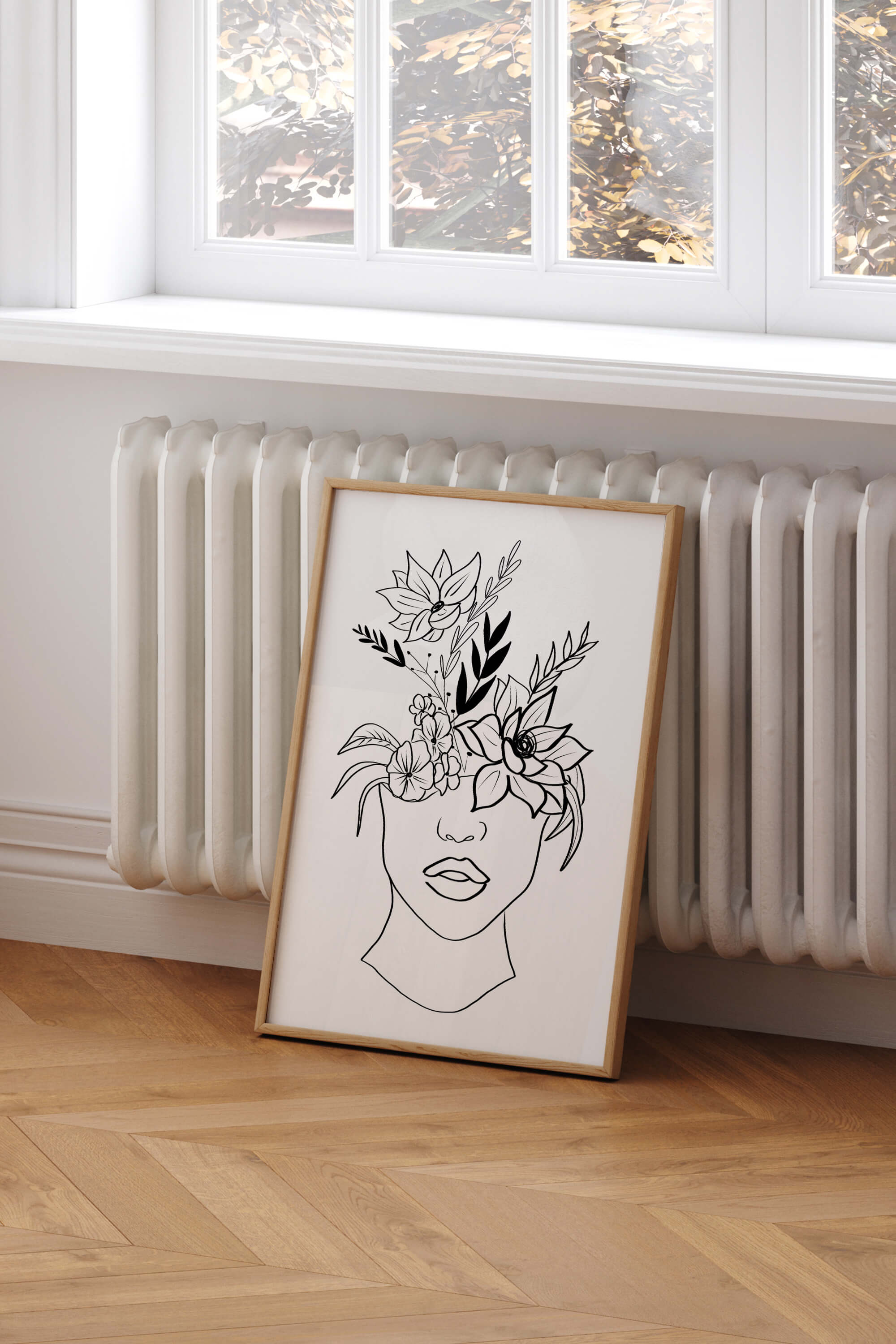 Monochrome line art depicting a woman with bold lips and a flowery head. This art print tells a story of confidence and empowerment, perfect for redefining your living space.