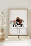 Serene book lover's artwork with a woman adorned by a flower head, a peaceful addition to any reading nook.