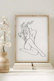 Self-love wall art with empowering female form lines in black and white. Create your sanctuary with this timeless print, celebrating the beauty within.