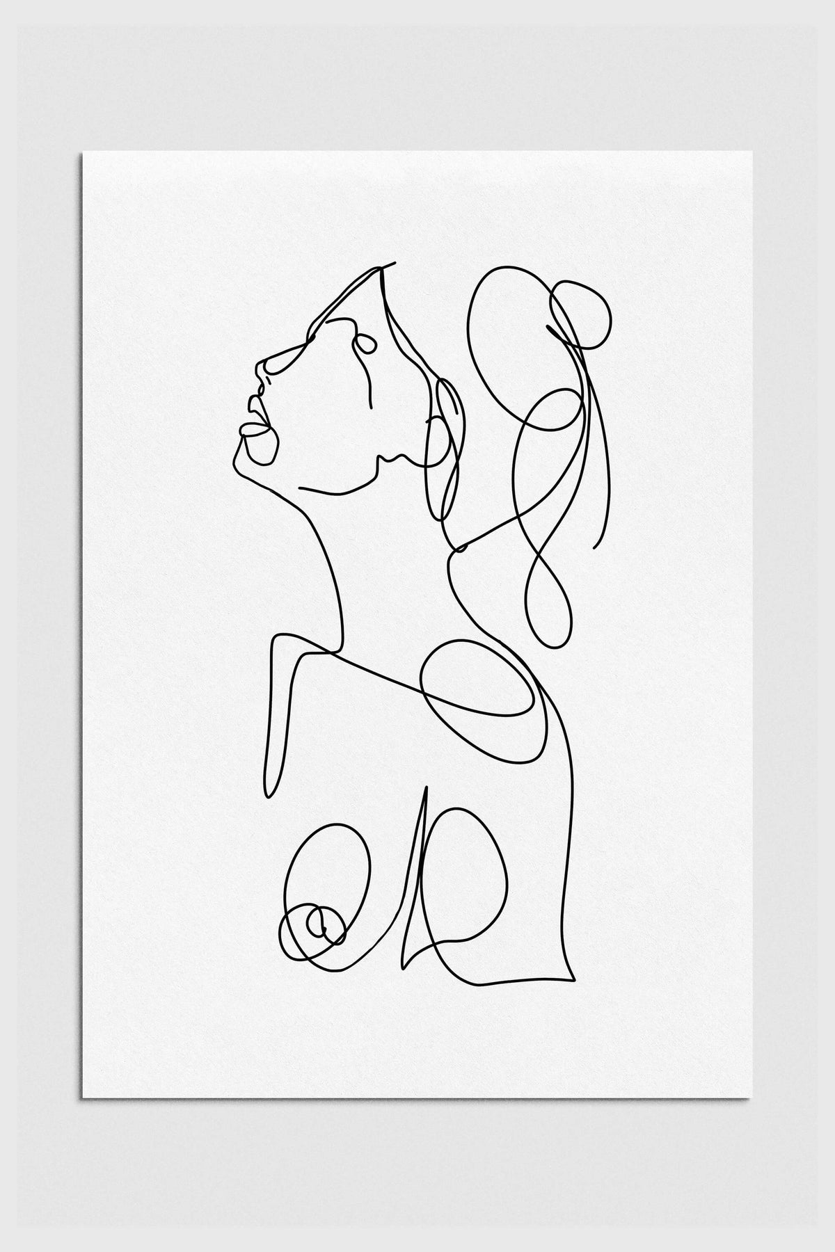 Minimalist woman line drawing in black and white. Capturing elegance and modernity, this sophisticated art print adds a touch of class to your living space. Perfect for contemporary home decor.