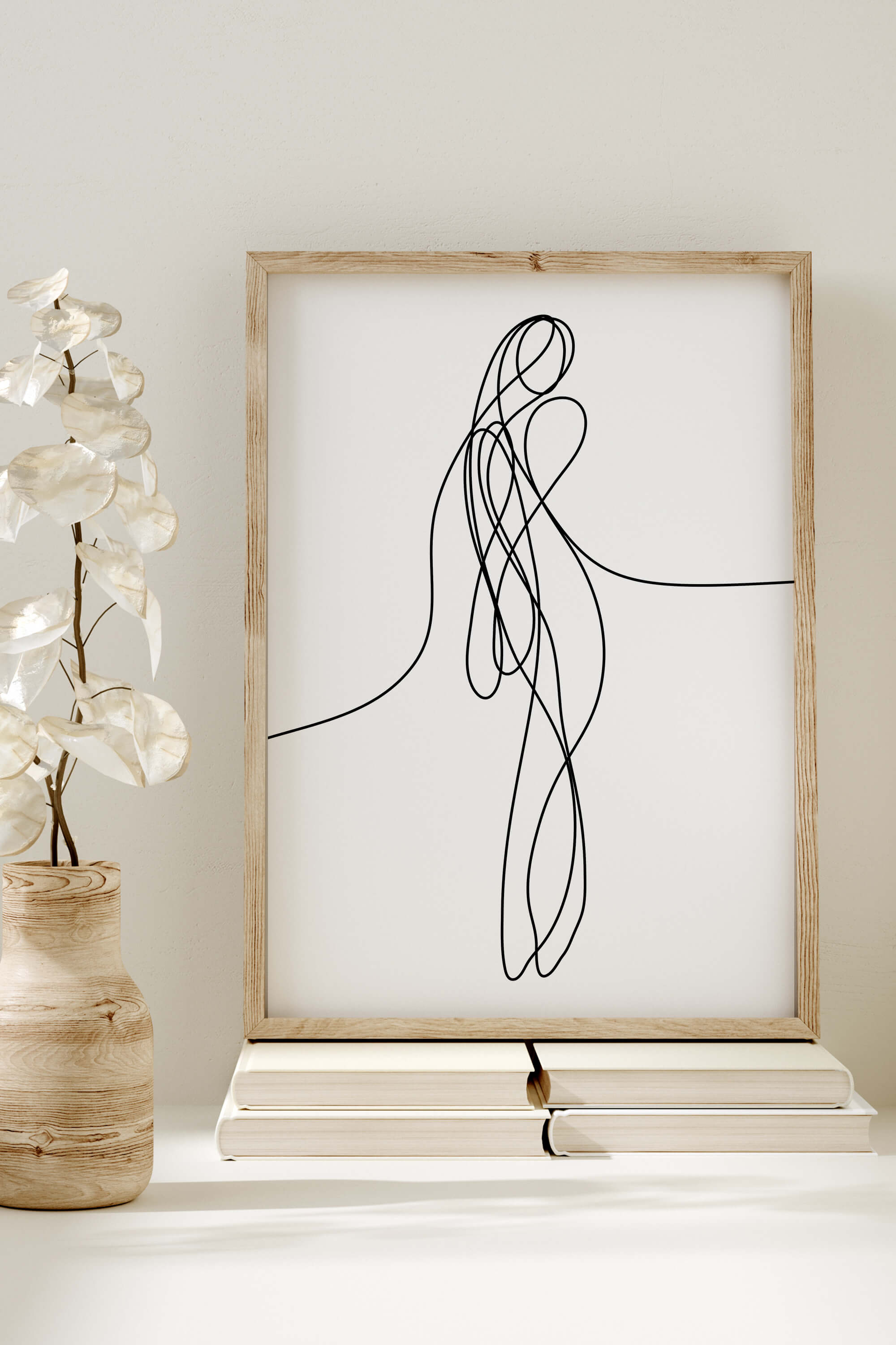 Symphony of style for your walls. Modern and unique, this art print merges body silhouettes in a captivating dance of form and expression. A statement piece for those with a taste for the extraordinary.