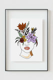 Vibrant floral head artwork of a woman's face with red lips, exuding nature-inspired style.