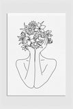 Abstract beauty captured in a black and white line art print of a woman with a flower head. The intricate lines evoke a sense of modern elegance and nature-inspired art.