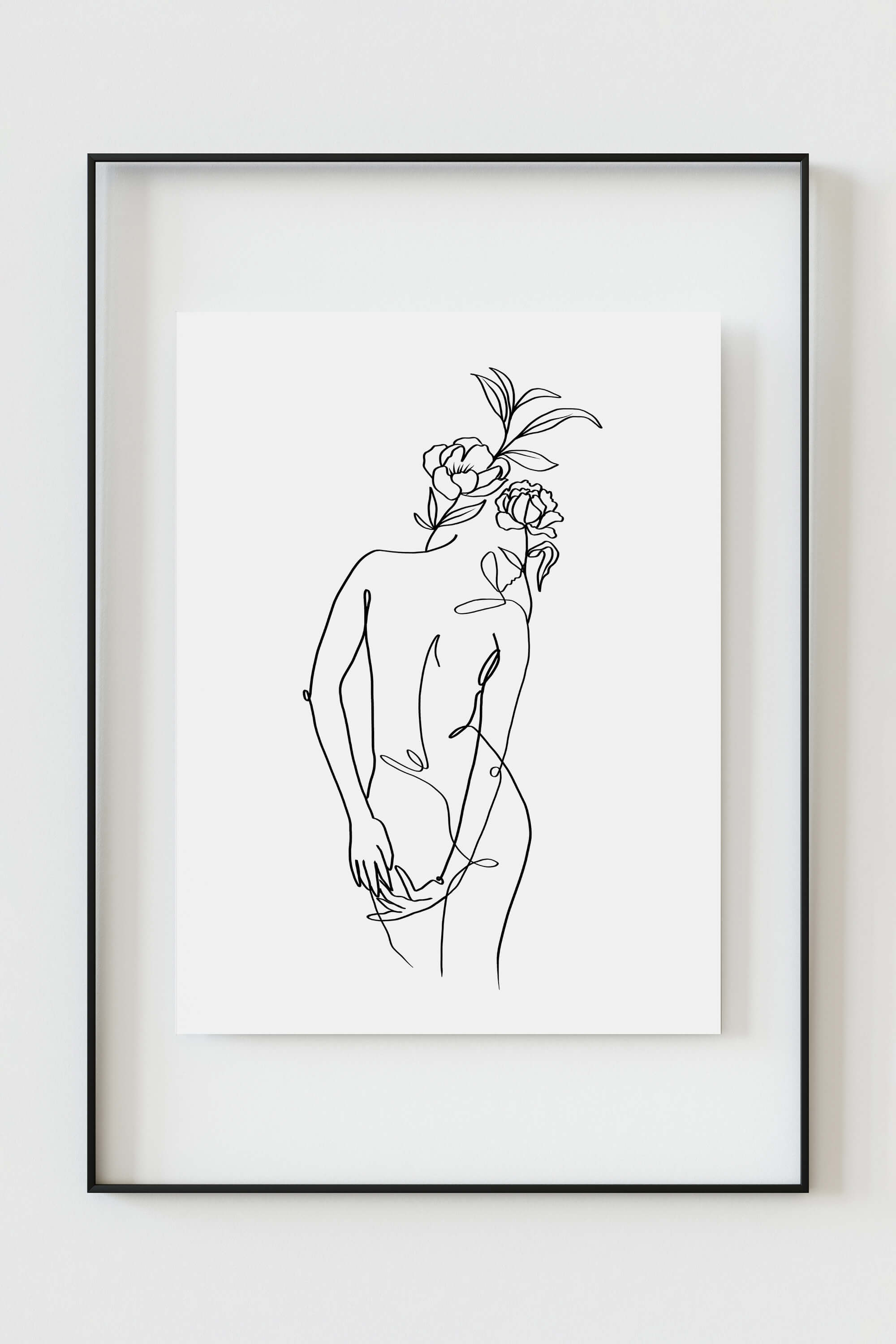 An art print featuring a nude female form, captured in simple yet profound lines against a white background. The monochrome aesthetic emphasizes the beauty of simplicity, making it a striking addition to any contemporary art collection.